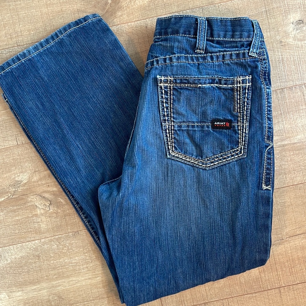 Mens Gently worn Ariat FR low rise, boot cut jean